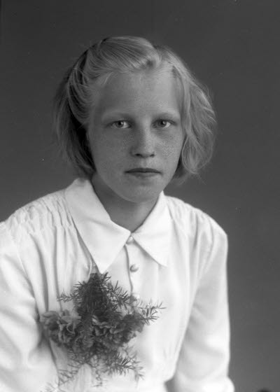 Porträtt av en flicka. Ateljefoto.