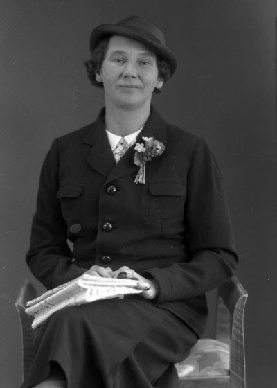 Porträtt av en dam. Ateljefoto.