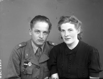 Porträtt av en herre och en dam. Ateljefoto.