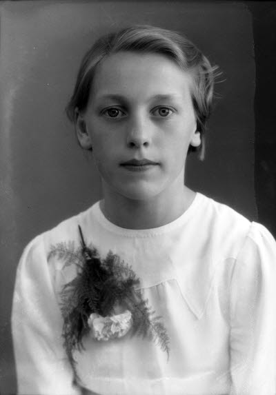 Porträtt av en flicka. Ateljefoto.