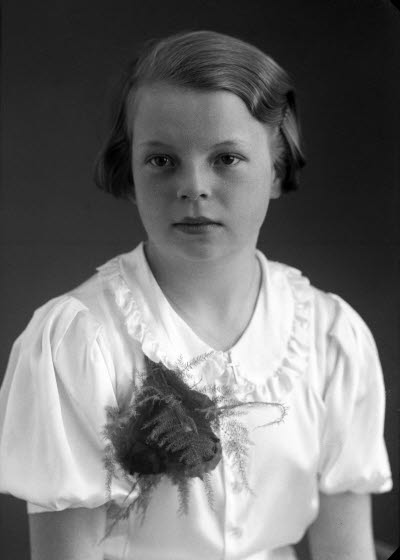 Porträtt av en flicka. Ateljefoto.