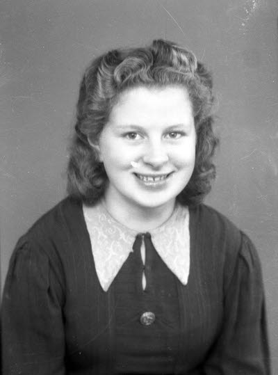 Porträtt av en dam. Ateljefoto.