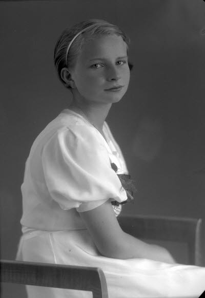 Porträtt av en flicka. Ateljefoto.