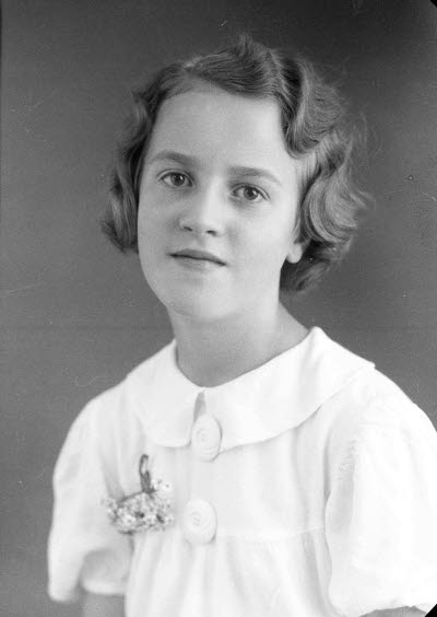 Porträtt av en flicka. Ateljefoto.