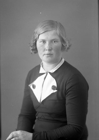 Porträtt av en dam. Ateljefoto.