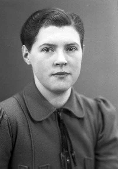 Porträtt av en dam. Ateljefoto.