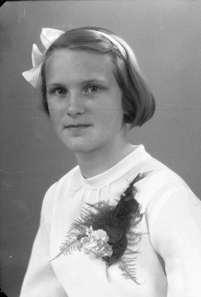 Porträtt av en flicka. Ateljefoto.