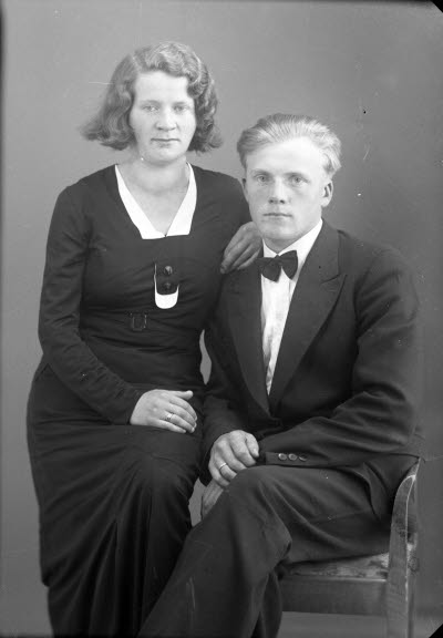 Porträtt av ett par. Ateljefoto.