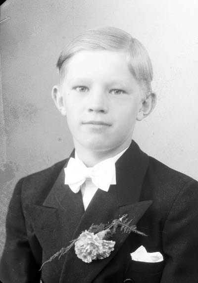 Porträtt av en pojke. Ateljefoto.