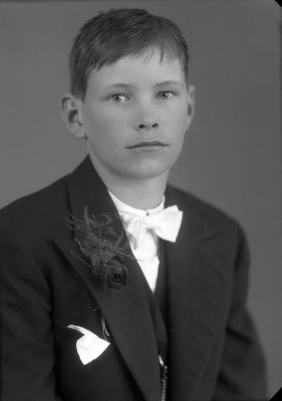 Porträtt av en pojke. Ateljefoto.