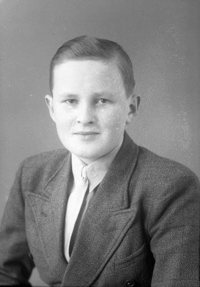 Porträtt av en ung herre. Ateljefoto.