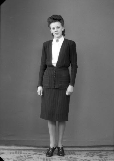 Porträtt av en dam. Ateljefoto.