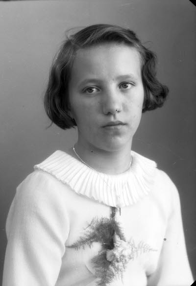 Porträtt av en flicka. Ateljefoto.