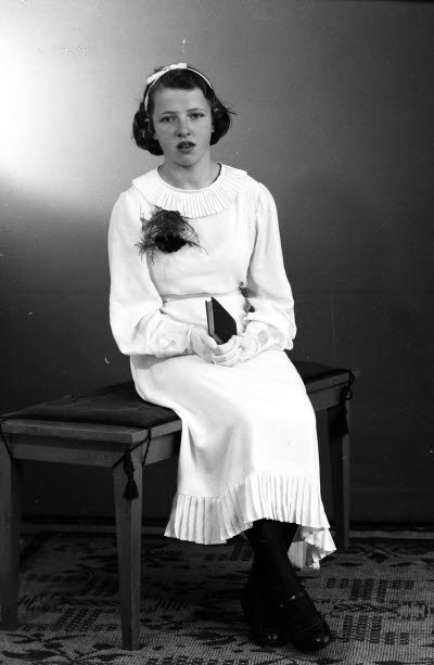 Porträtt av en flicka. Ateljefoto.