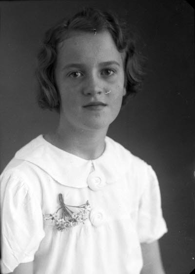 Porträtt av en flicka. Ateljefoto.