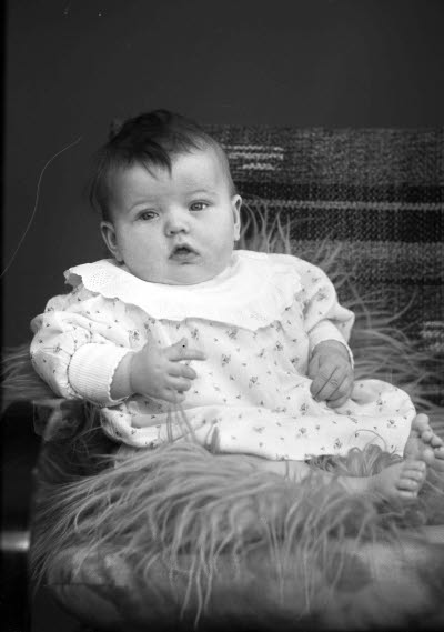 Porträtt av ett barn. Ateljefoto.