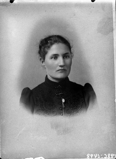 Porträtt av en dam.