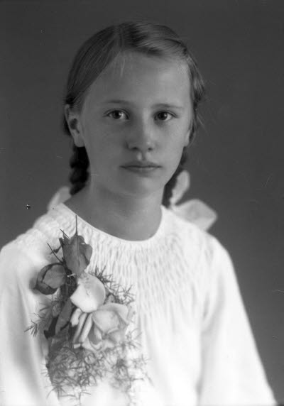 Porträtt av en flicka. Ateljefoto.