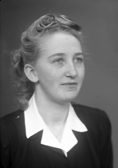 Porträtt av en dam.