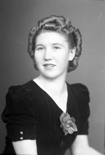 Porträtt av en dam. Ateljefoto.