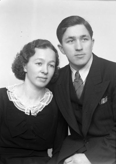 Porträtt av ett par. Ateljefoto.