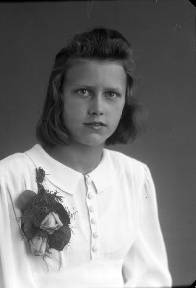 Porträtt av en flicka. Ateljefoto.