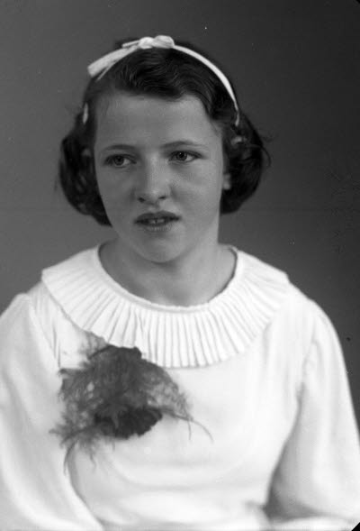 Porträtt av en flicka. Ateljefoto.