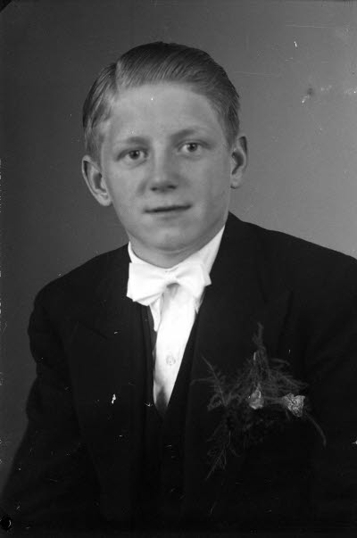 Porträtt av en pojke. Ateljefoto.