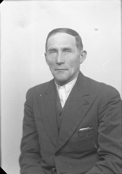 Porträtt av en herre. Ateljefoto.