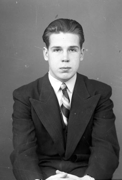 Porträtt av en ung herre. Ateljefoto.