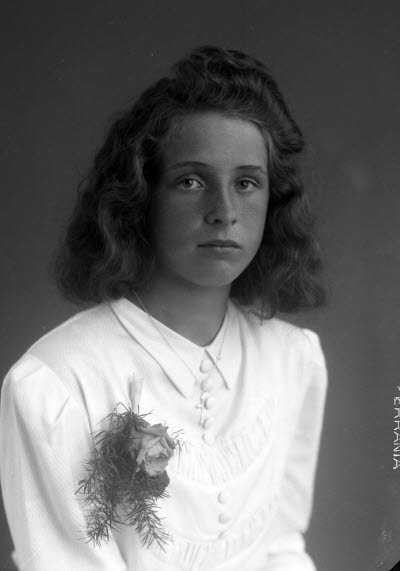 Porträtt av en flicka. Ateljefoto.