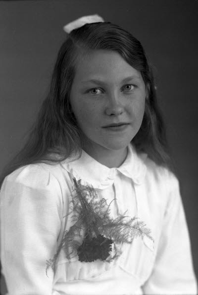 Porträtt av en flicka. Ateljefoto.