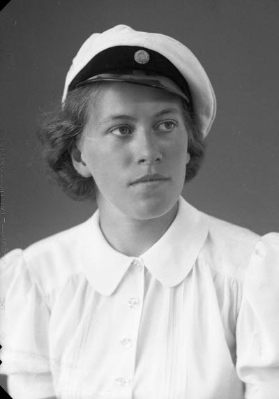 Porträtt av en flicka. Ateljefoto.