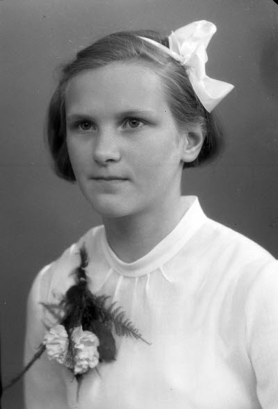 Porträtt av en flicka. Ateljefoto.