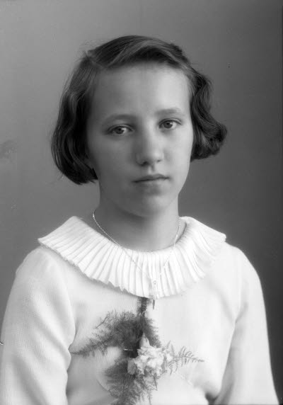 Porträtt av en flicka. Ateljefoto.