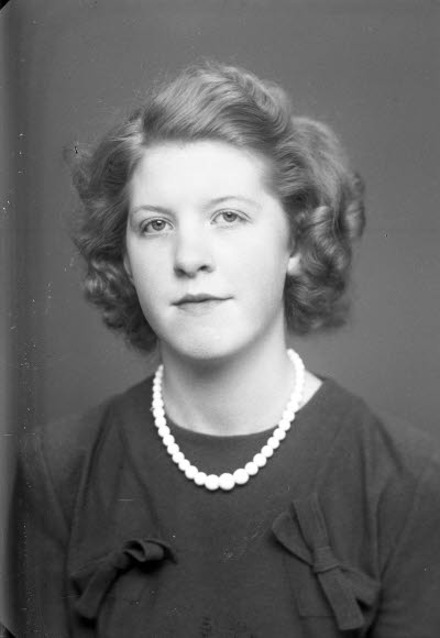 Porträtt av en dam. 