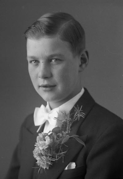 Porträtt av en pojke. Ateljefoto.