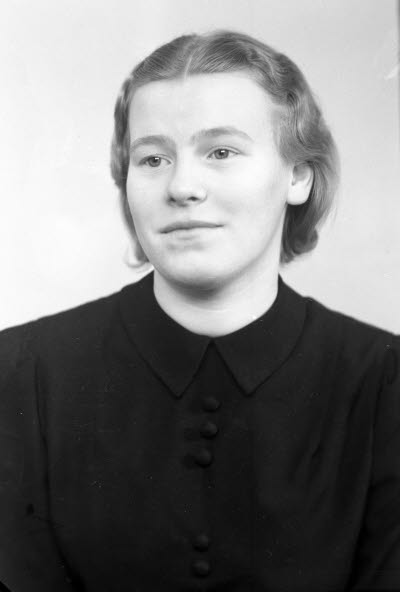 Porträtt av en dam. Ateljefoto.