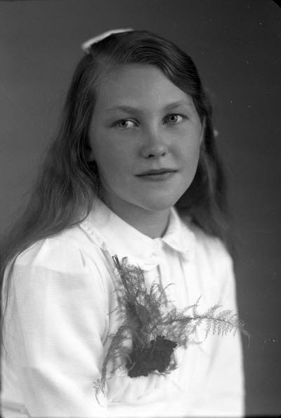 Porträtt av en flicka. Ateljefoto.