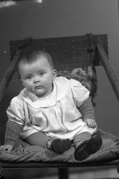 Porträtt av ett barn. Ateljefoto.