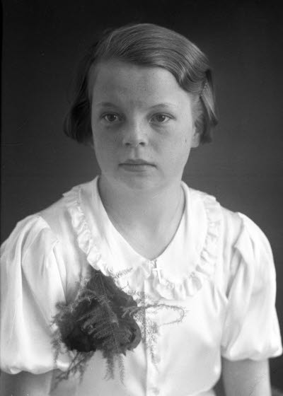 Porträtt av en flicka. Ateljefoto.