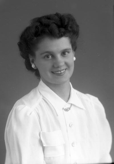 Porträtt av en dam. Ateljefoto.