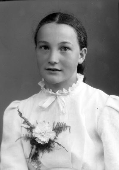 Porträtt av en flicka. Ateljefoto.