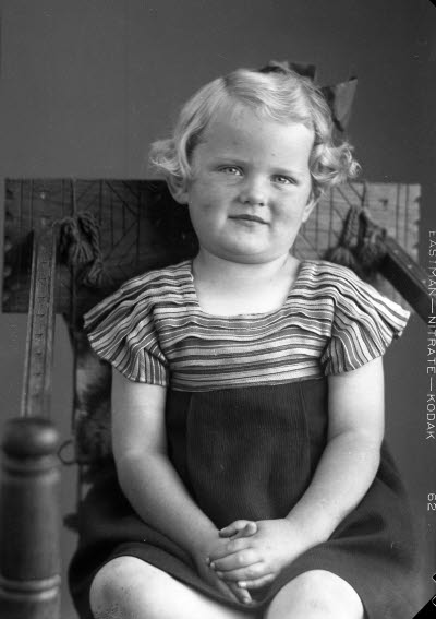 Porträtt av ett barn, en flicka.