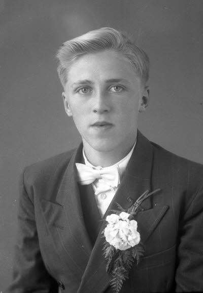 Porträtt av en pojke. Ateljefoto.