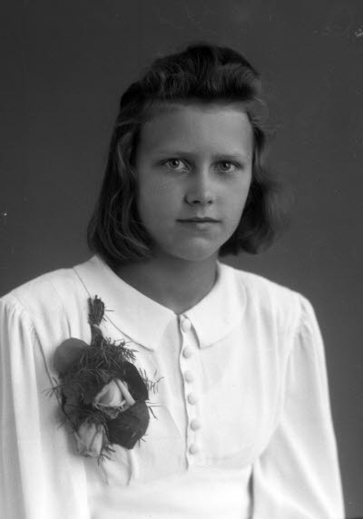 Porträtt av en flicka. Ateljefoto.