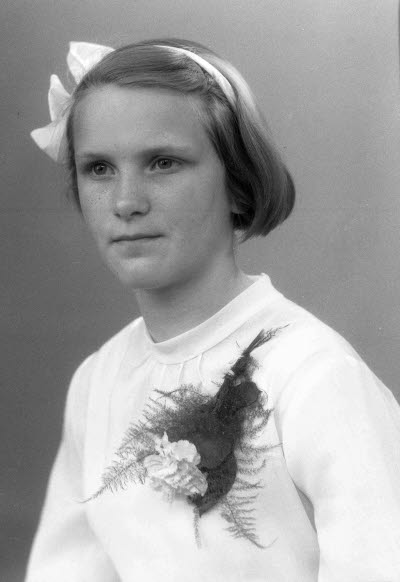 Porträtt av en flicka. Ateljefoto.