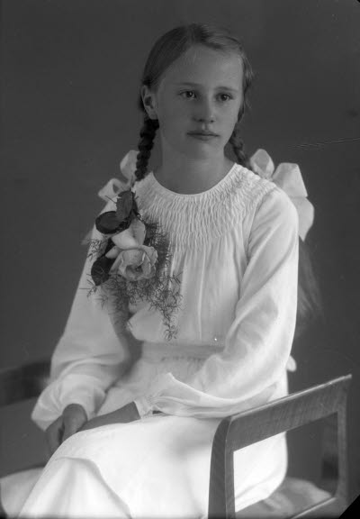 Porträtt av en flicka. Ateljefoto.