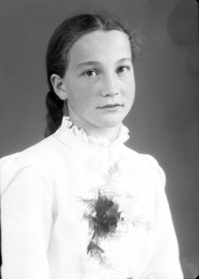 Porträtt av en flicka. Ateljefoto.