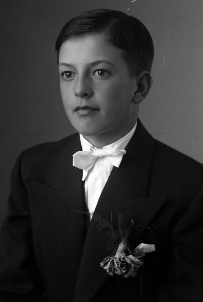 Porträtt av en pojke. Ateljefoto.